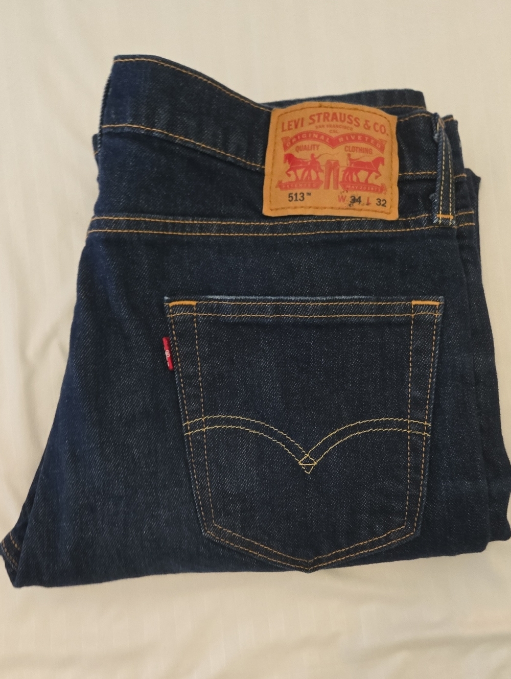 Levi's Slim Straight Men's Jeans in Dark Indigo with Gold Stitching